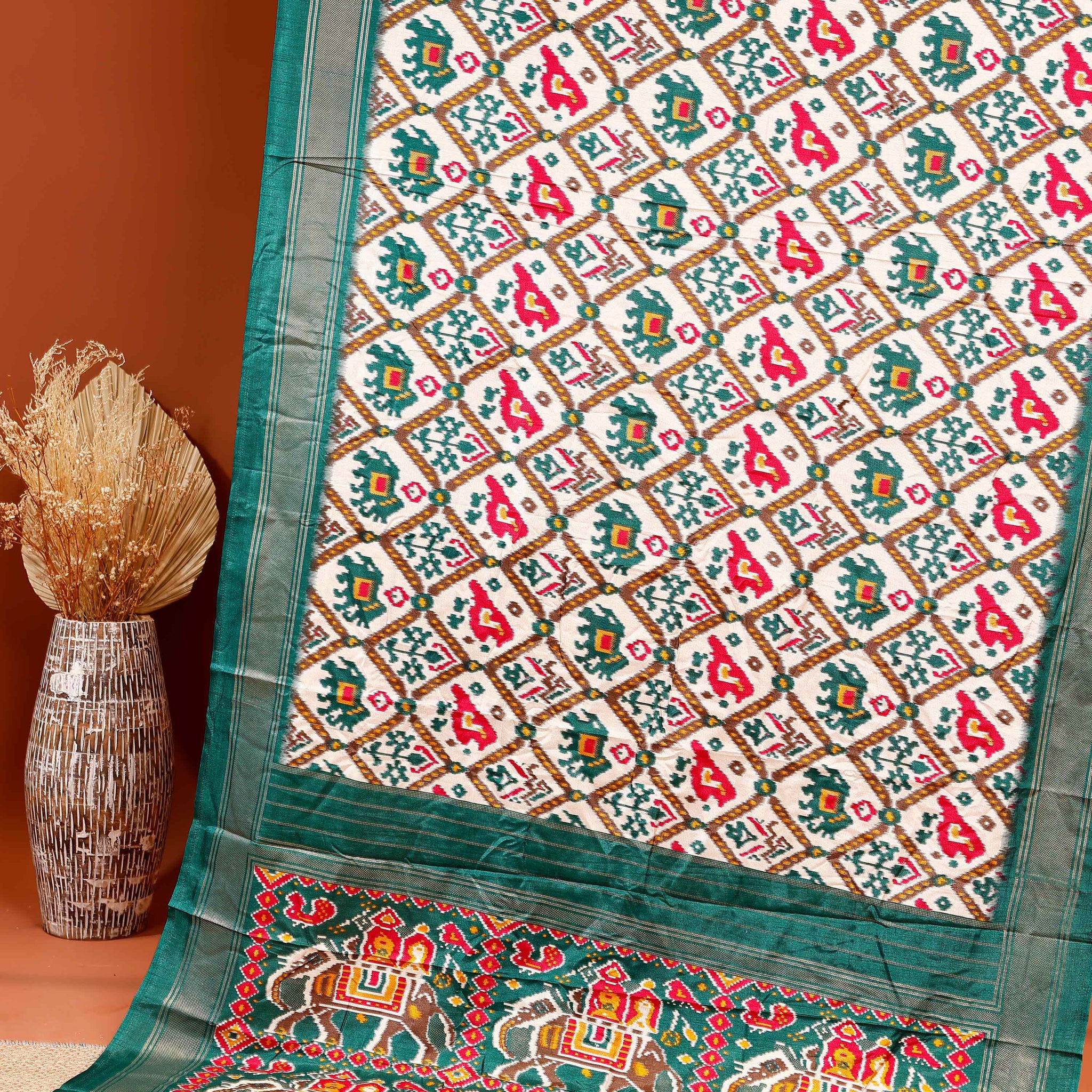 Traditional Handwoven Ikkat Saree with Geometric Patterns and Elephant Motif Pallu - Green