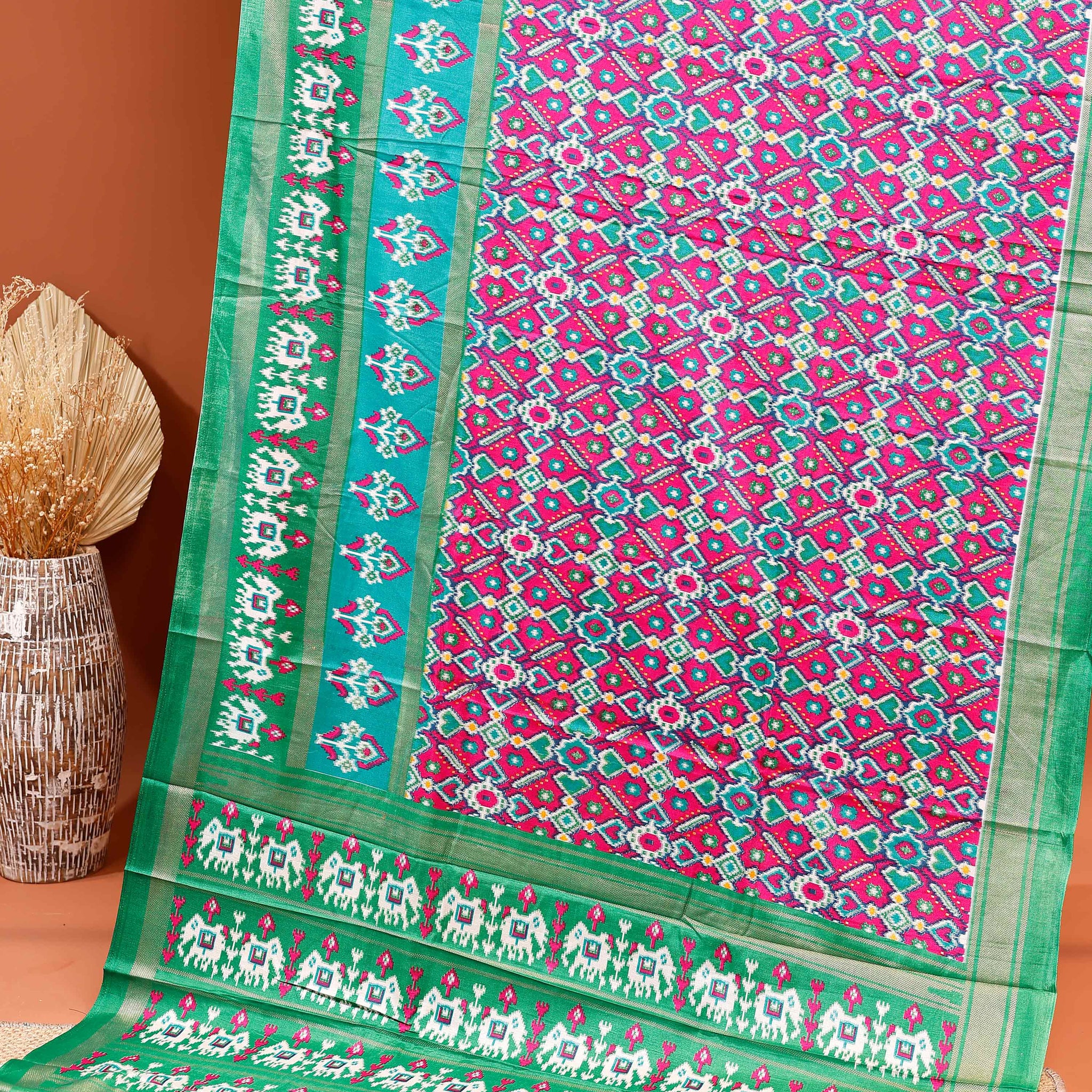 Traditional Handwoven Ikkat Saree with Geometric Patterns and Elephant Motif Pallu - Multi