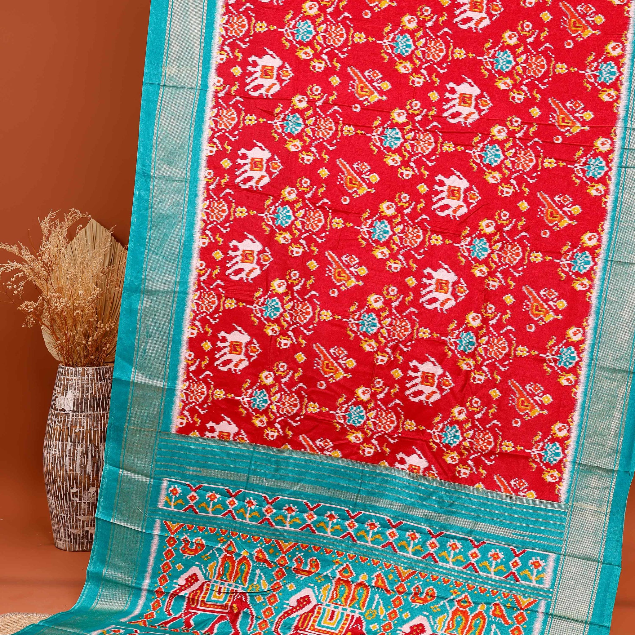 Traditional Ikkat Saree with Patola Inspired Weave and Animal Motifs  - Red