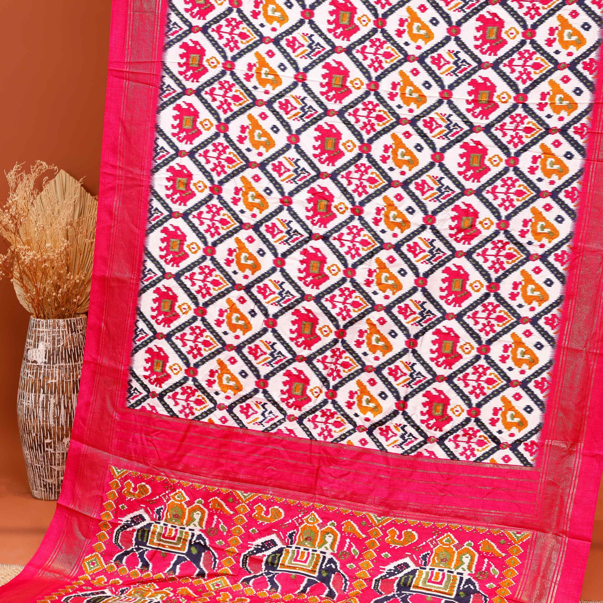 Handloom Ikkat Saree with Traditional Patola Inspired Motifs and Animal Border Design - Multi