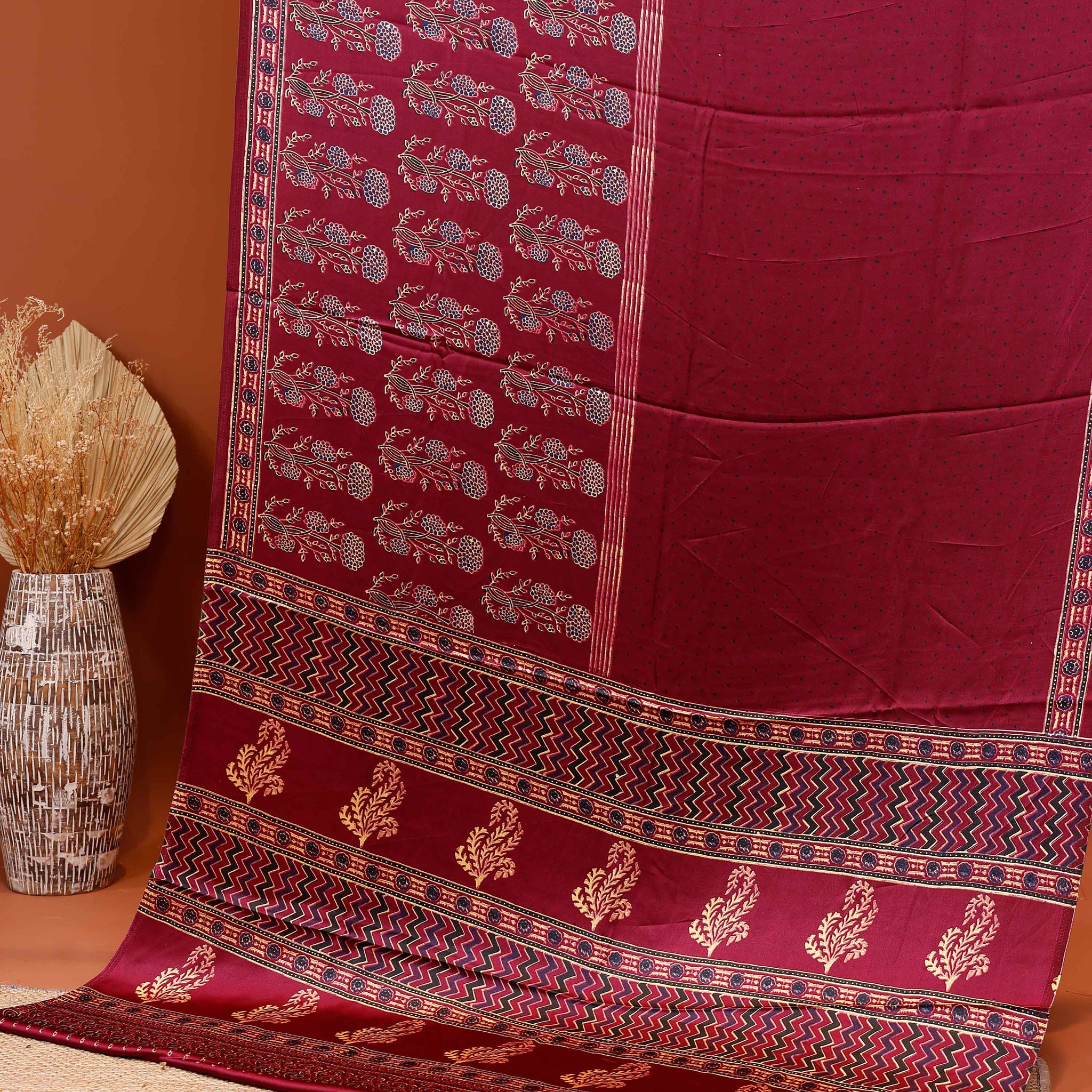 Elegant Printed Modal Satin Saree with Zari Border and Traditional Motifs  - Maroon