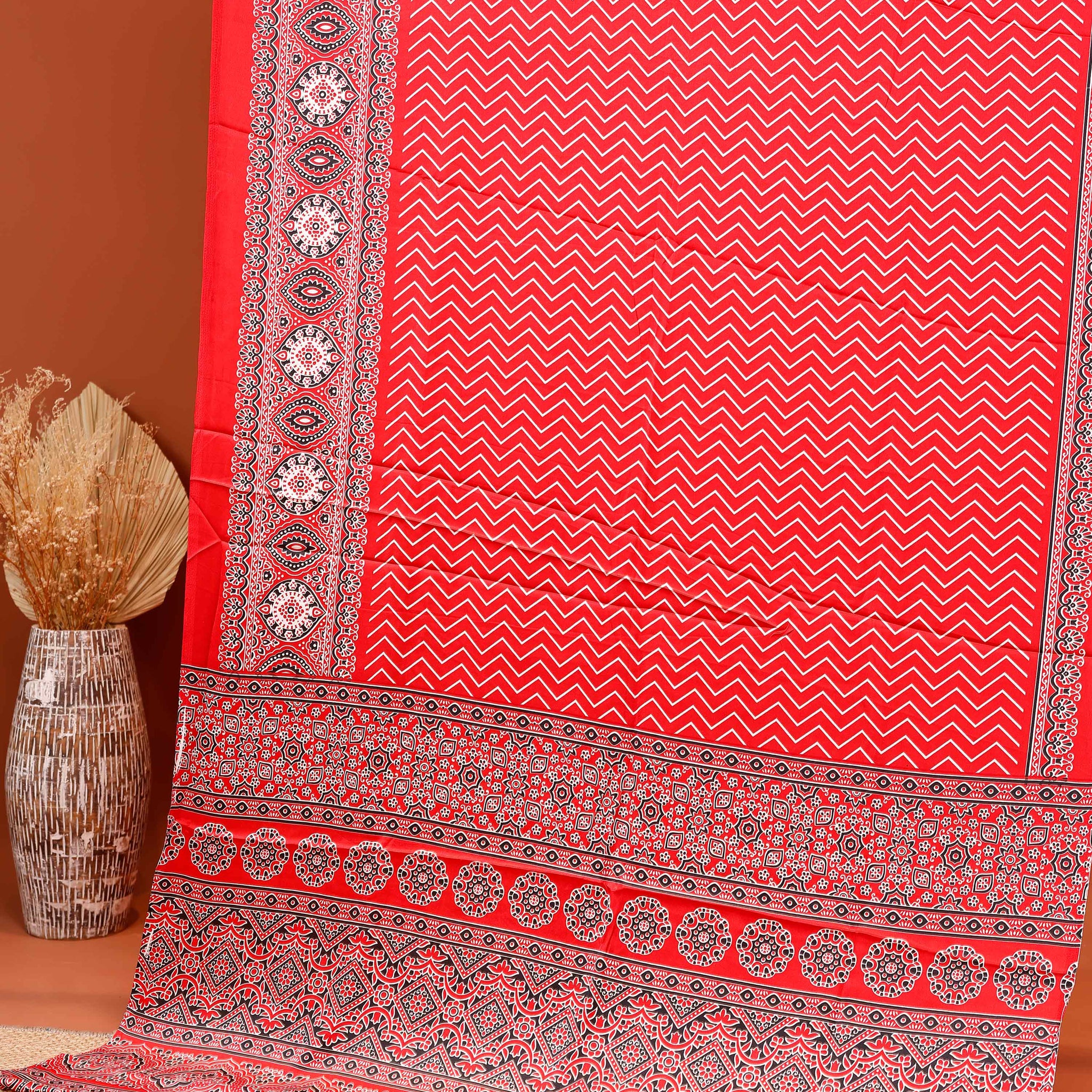 Stylish Modal Satin Saree with Zigzag Pattern and a Richly Detailed Traditional Border - Red