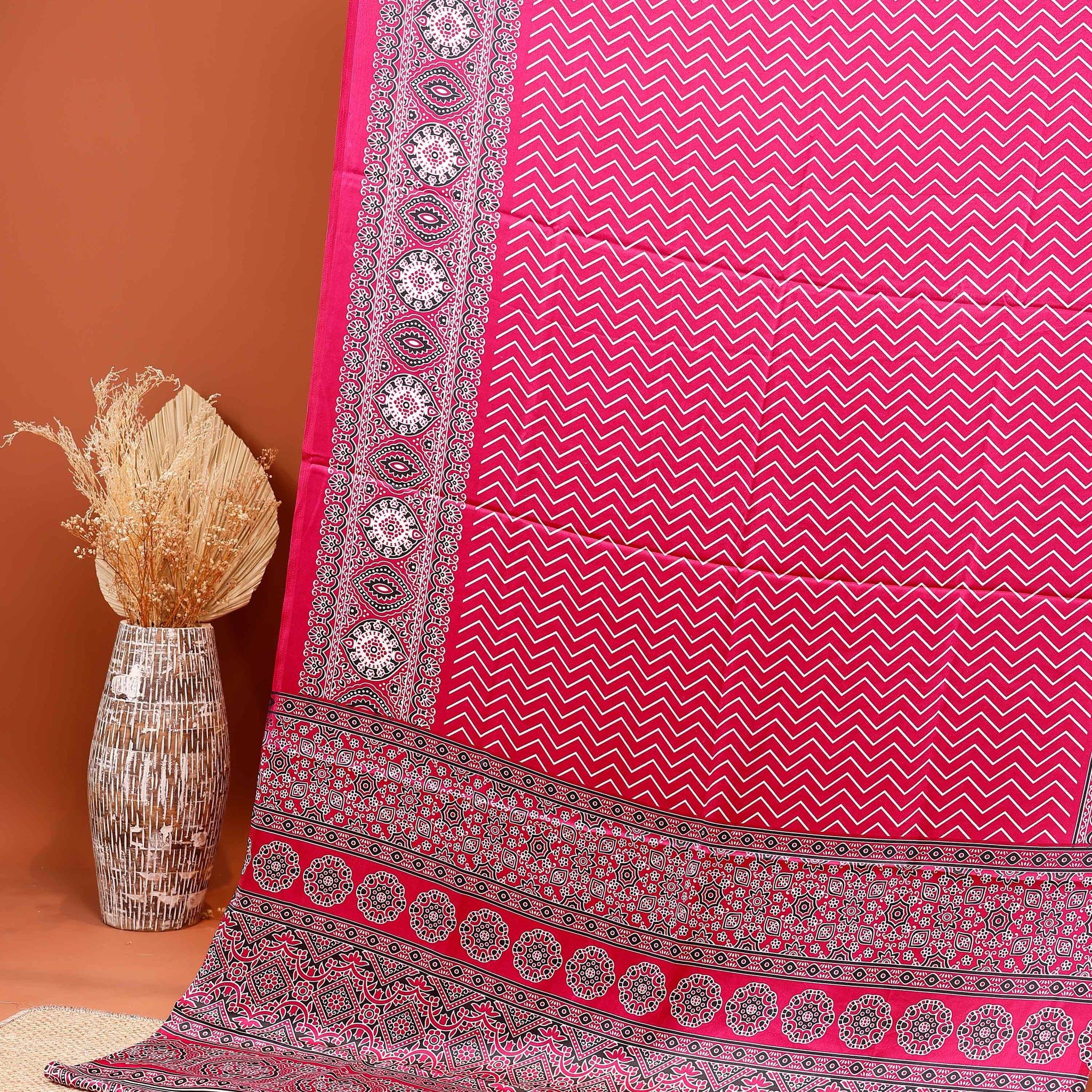 Stylish Modal Satin Saree with Zigzag Pattern and Intricate Ethnic Motifs and Traditional Border - Pink