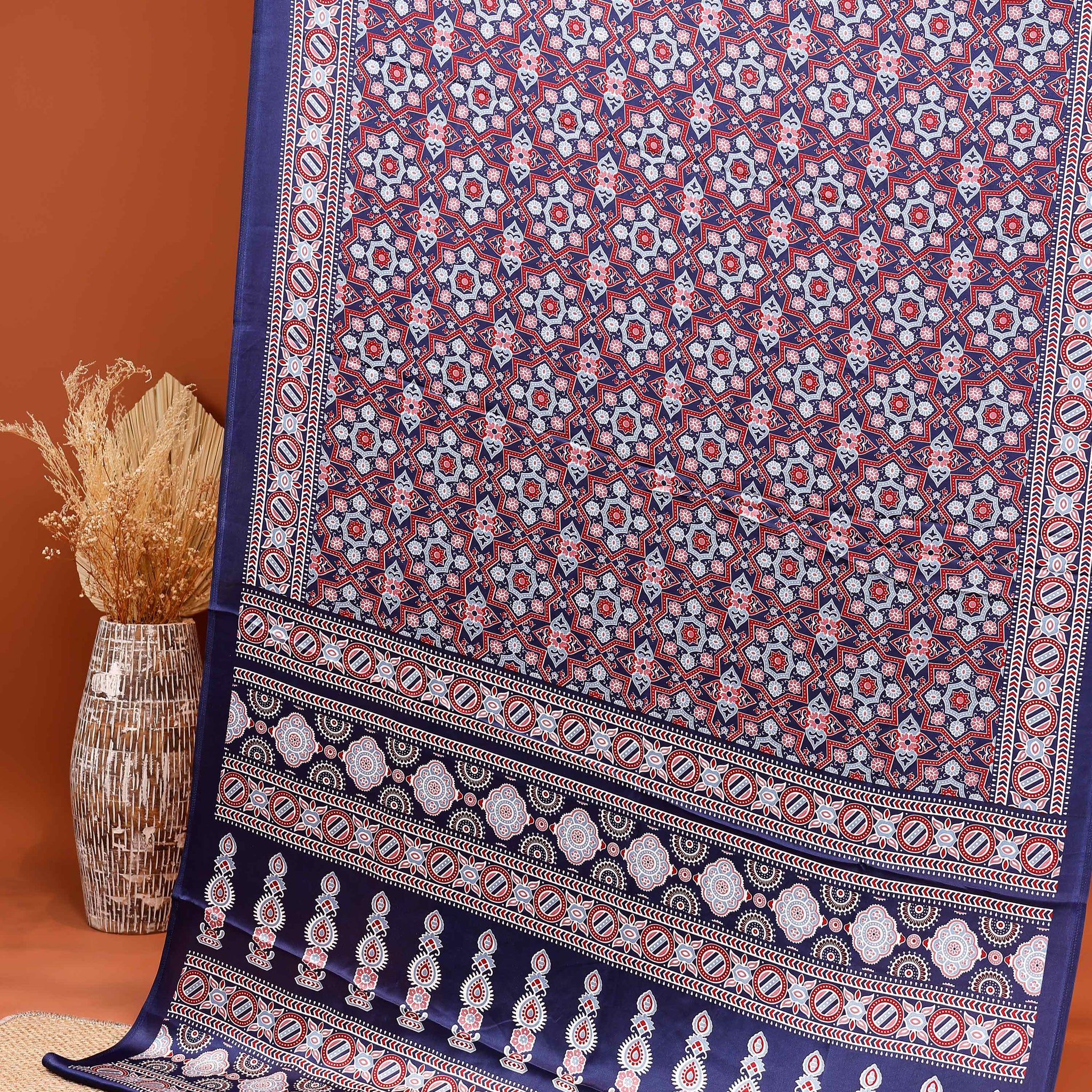 Modal Satin Saree with Intricate Floral Motifs and Traditional Geometric Patterns  - Purple