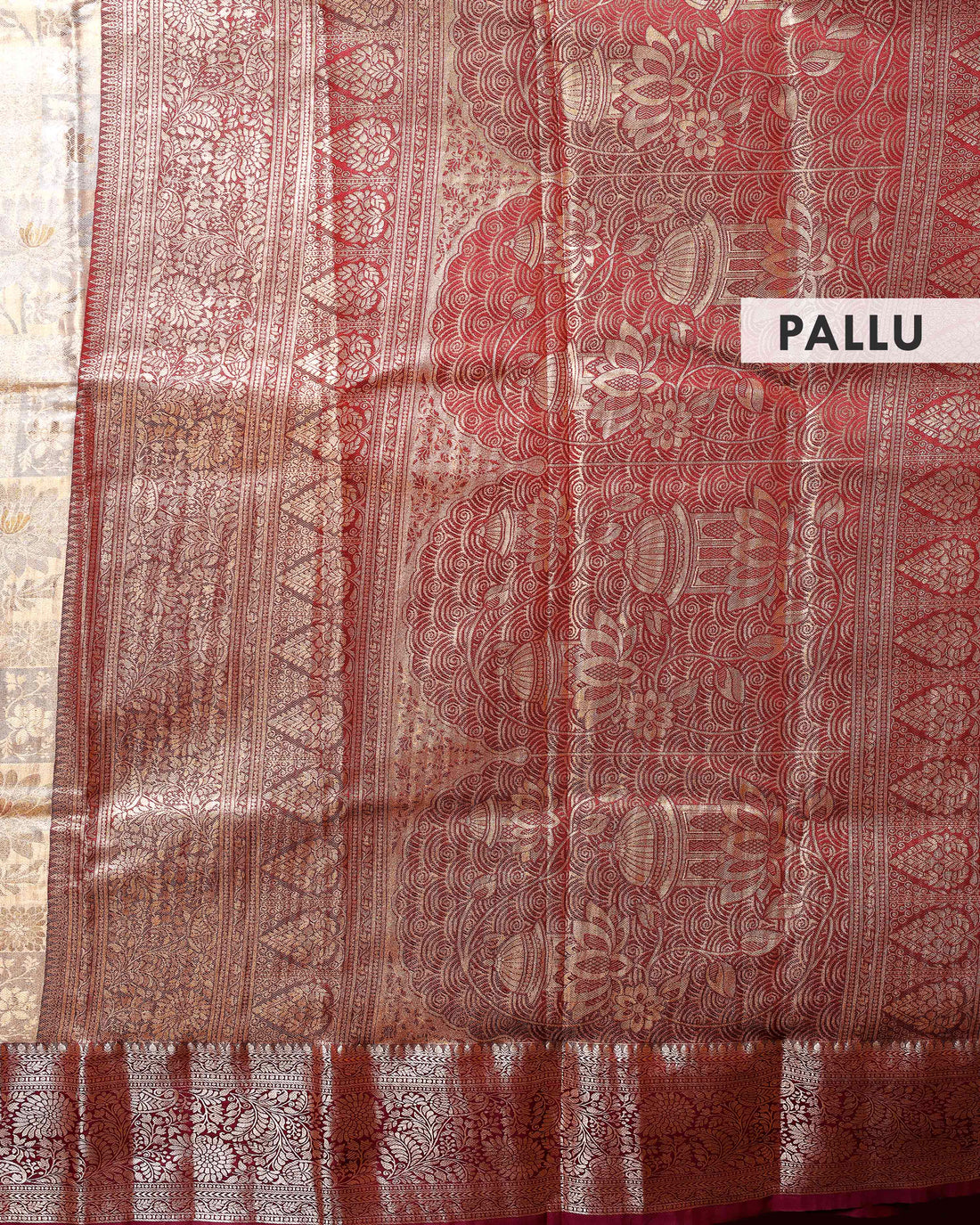 Elegant Niranjana Silk Saree with Intricate Zari Weaving and Contrasting Floral Border - Brown