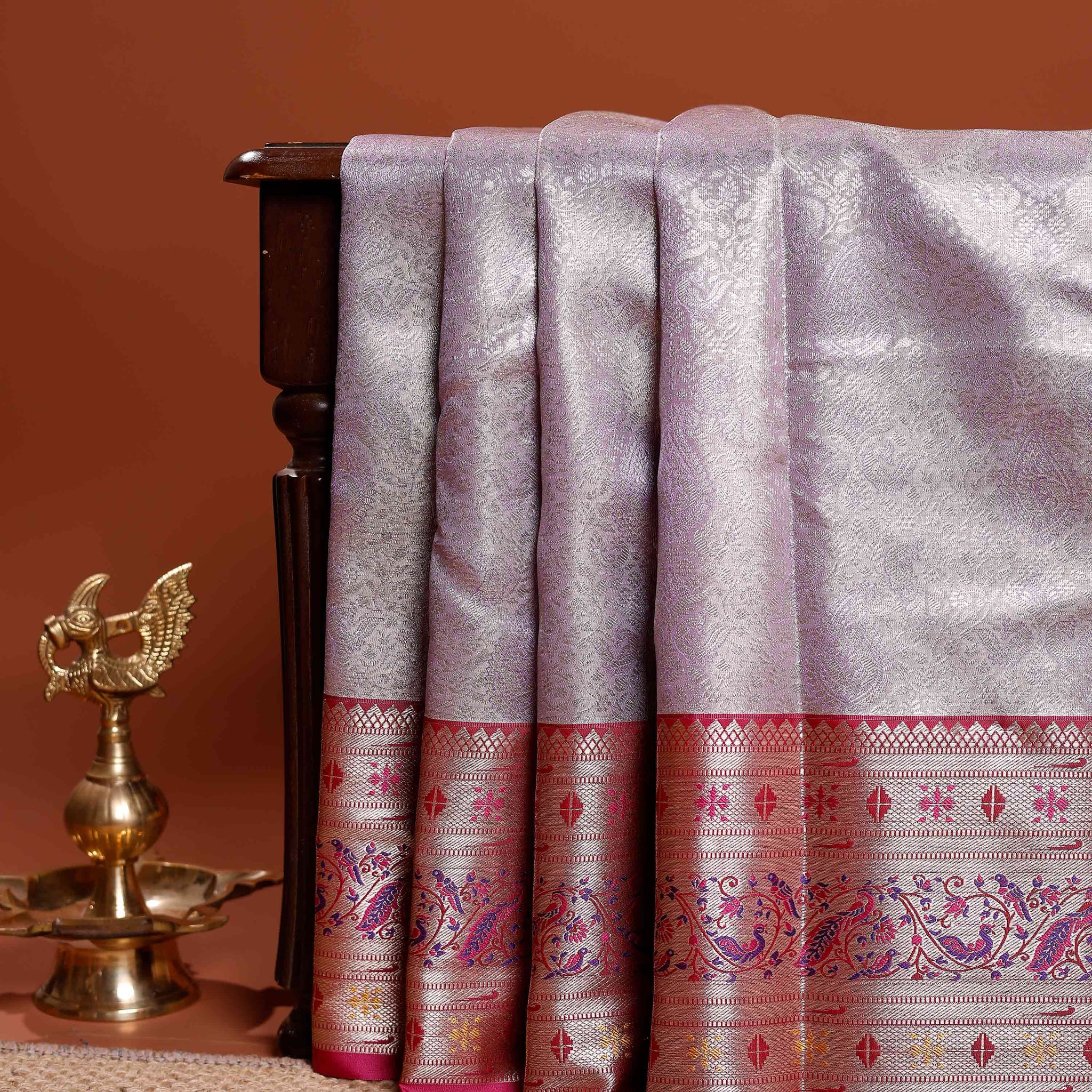 Elegant Niranjana Silk Saree with Intricate Zari Weaving and Traditional Border Motifs - Lavender