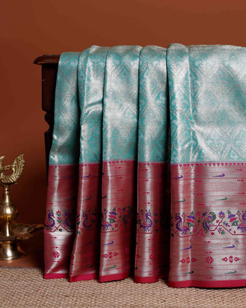 Elegant Niranjana Silk Saree with Traditional Zari Weave & Contrast Peacock Motif Border - Blue