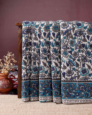 Traditional Kalamkari Cotton Saree Intricate Floral Motifs and a Distinctive Border Design - Cream