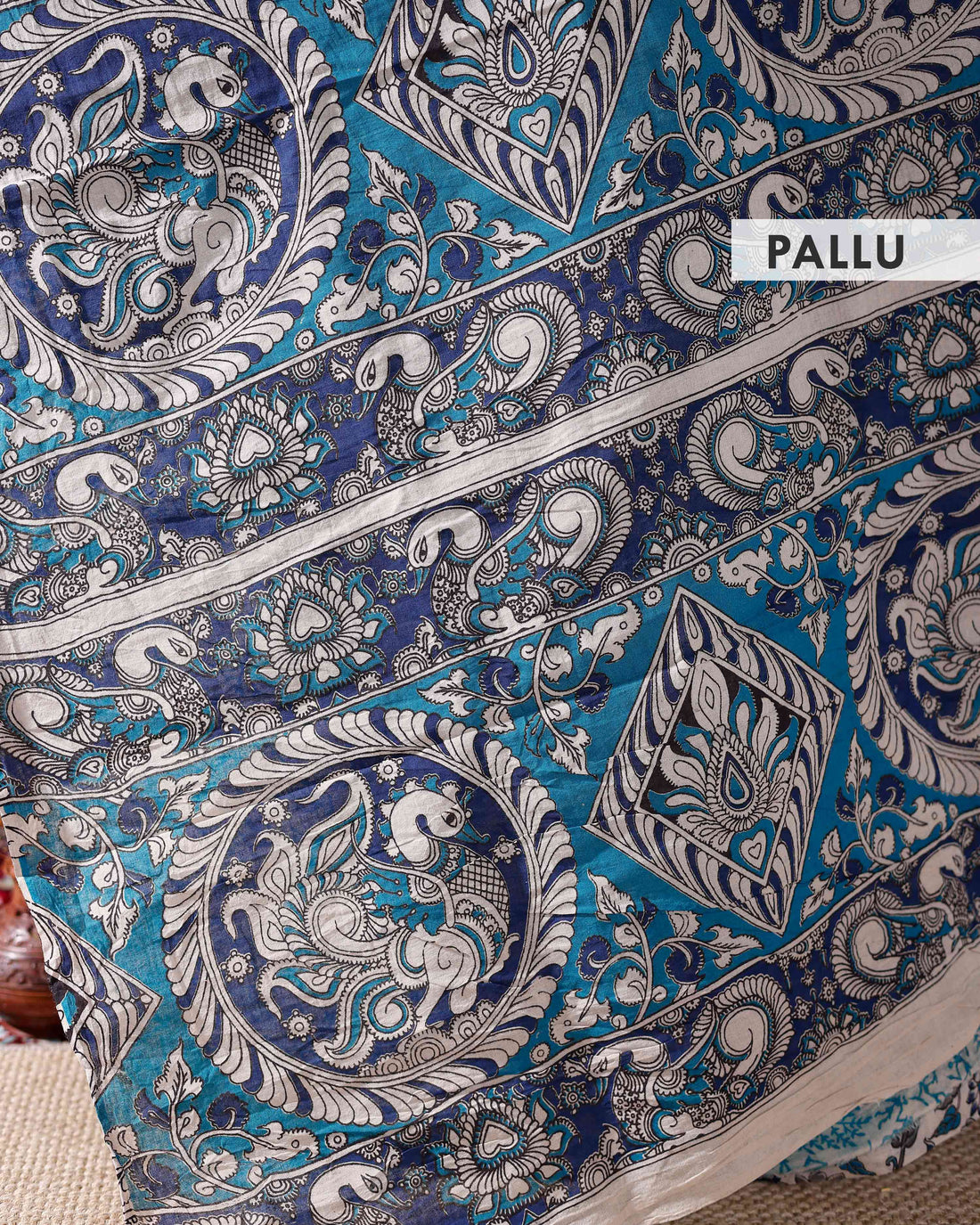 Traditional Kalamkari Cotton Saree Intricate Floral Motifs and a Distinctive Border Design - Cream