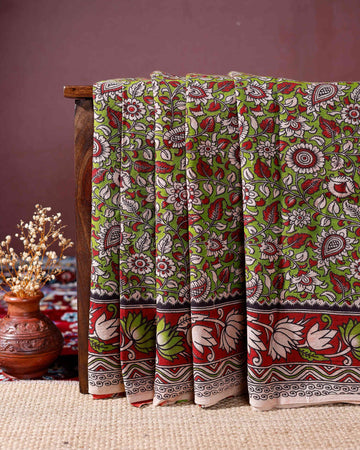 Traditional Kalamkari Cotton Saree with Floral and Leaf Motifs and Intricate Border Design - Green