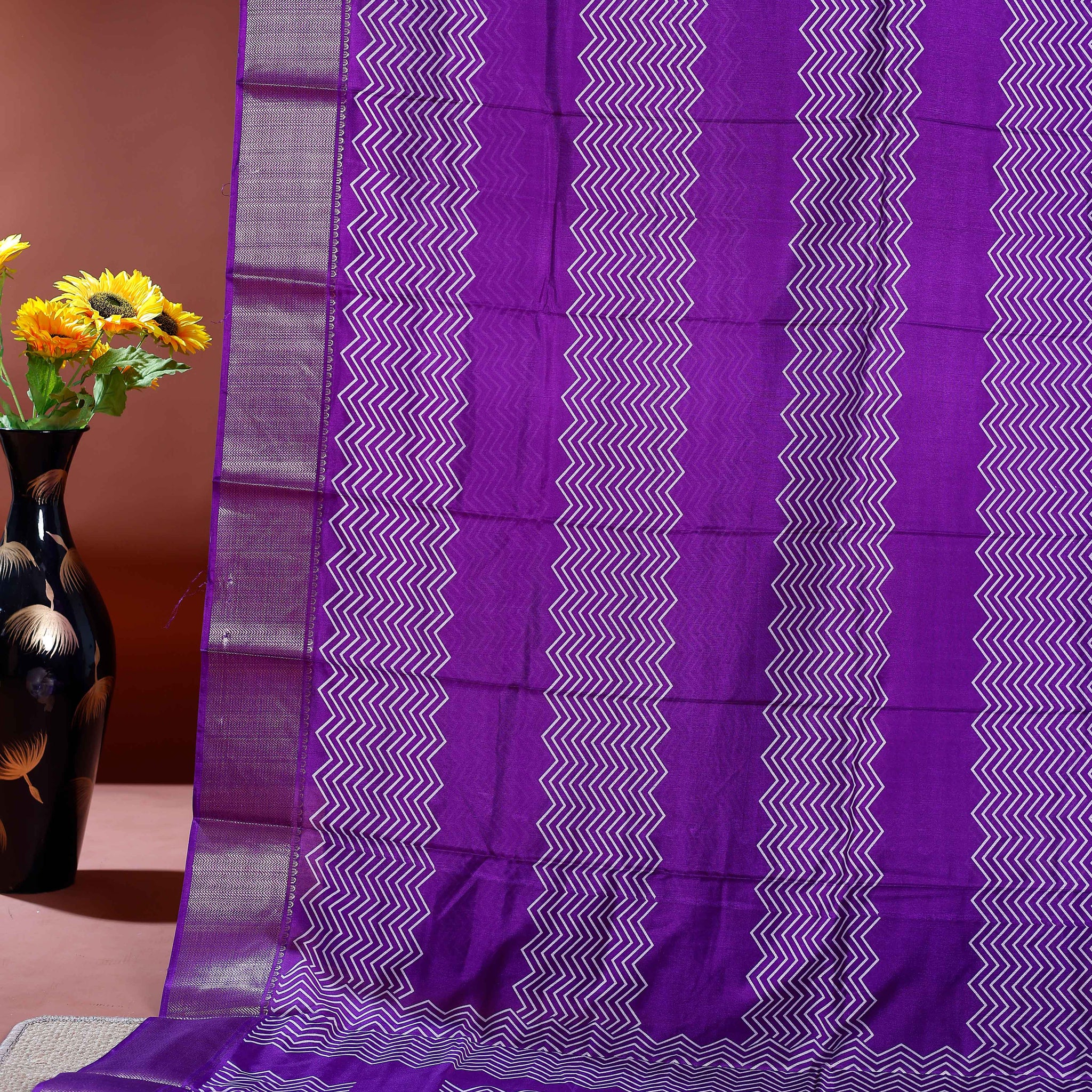 Elegant Dola Silk Saree with Intricate Zigzag Weave and Contrasting Border - Purple