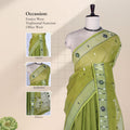 Bengal Cotton Saree With Woven Buti Motifs And Contrast Border In Green Draped On Mannequin -  Front View