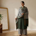 Dark Green Cotton Salwar Material With Striped Weave Grey Dupatta And Striped Border Front View