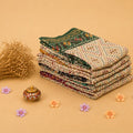 Semi Chanderi saree collection with multicolor printed designs and woven borders folded stack display.