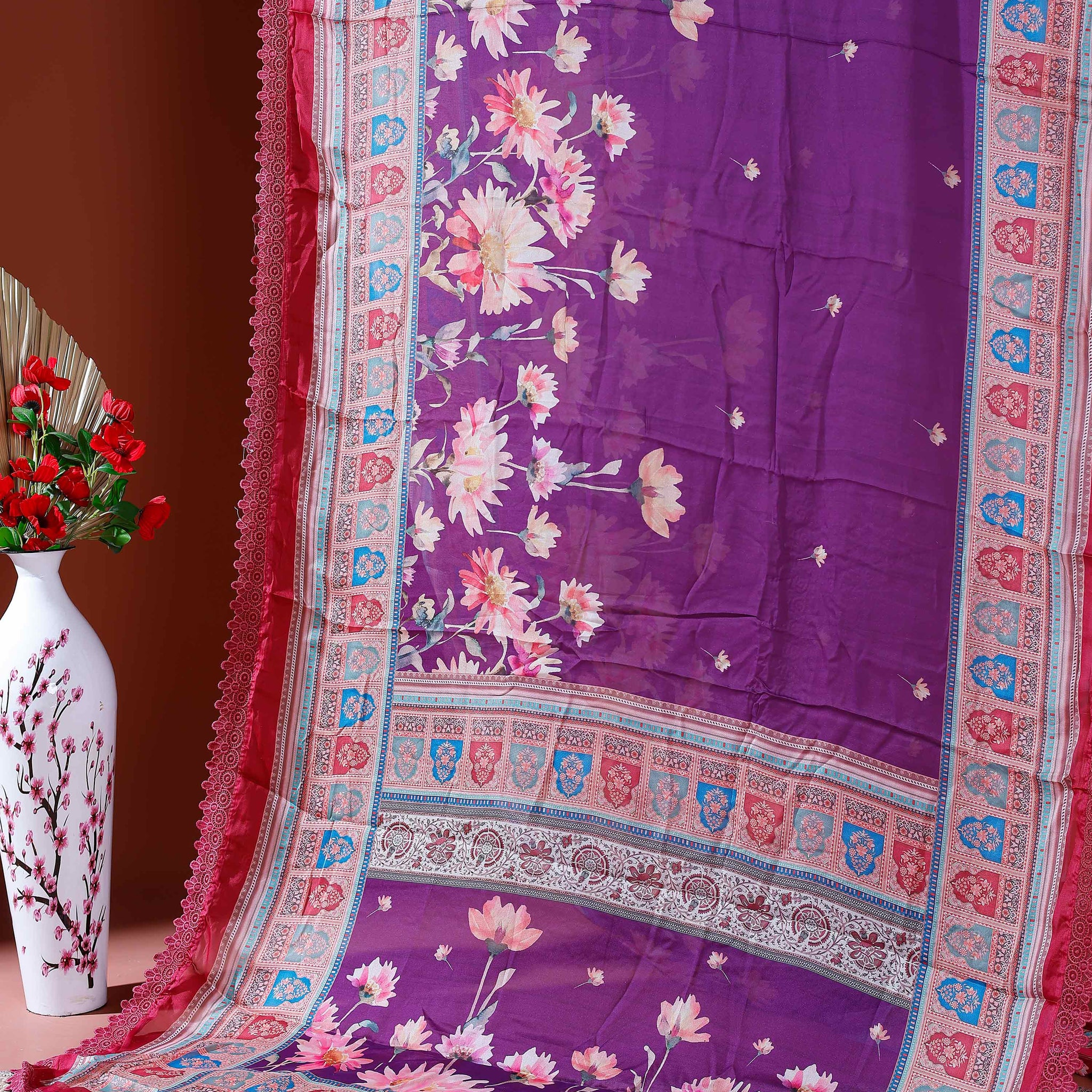 Stylish Georgette Saree with Bold Floral Prints and Traditional Patterned Border - Purple