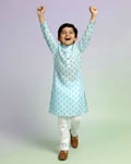 Boys green kurta adorned with traditional Bandhani-inspired patterns in red and gold., Dark Green