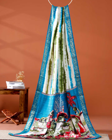 Elegant Blue shades and the rural scenic artwork Dola Saree