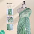 Bengal Cotton Saree With Self Woven Geometric And Spiral Motifs In  Green Draped Front View With Striped Border