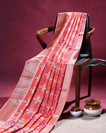 Elegant Dola Silk Saree with All-Over Ikkat Inspired Geometric Butta Motifs and Rich Traditional Zari Woven Border - Coral Pink