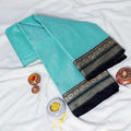 Traditional Mangalagiri Cotton Saree Aqua Blue Shade With Patterned Black Border Folded Flat Lay View