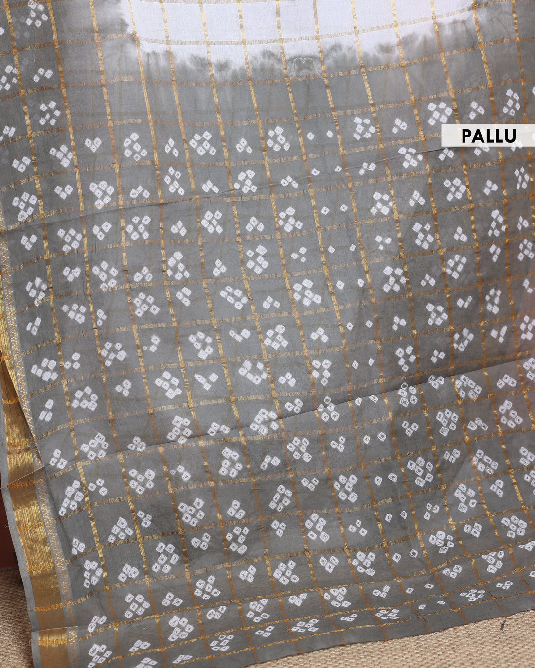 Elegant Bandhani Saree with Traditional Tie-Dye Motifs and Zari Border - White