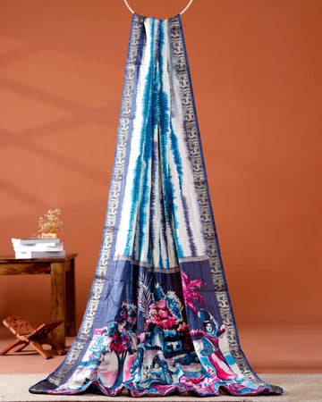 Elegant Navy Blue shades and the rural scenic artwork Dola Saree