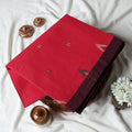 Bengal Cotton Saree With White Woven Butti Motifs And Plain Maroon Border In Red Folded Flat View