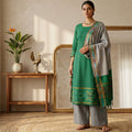 Green Salwar Material Set With Grey Pants Fabric And Colorful Ikat Dupatta Full Length Front View