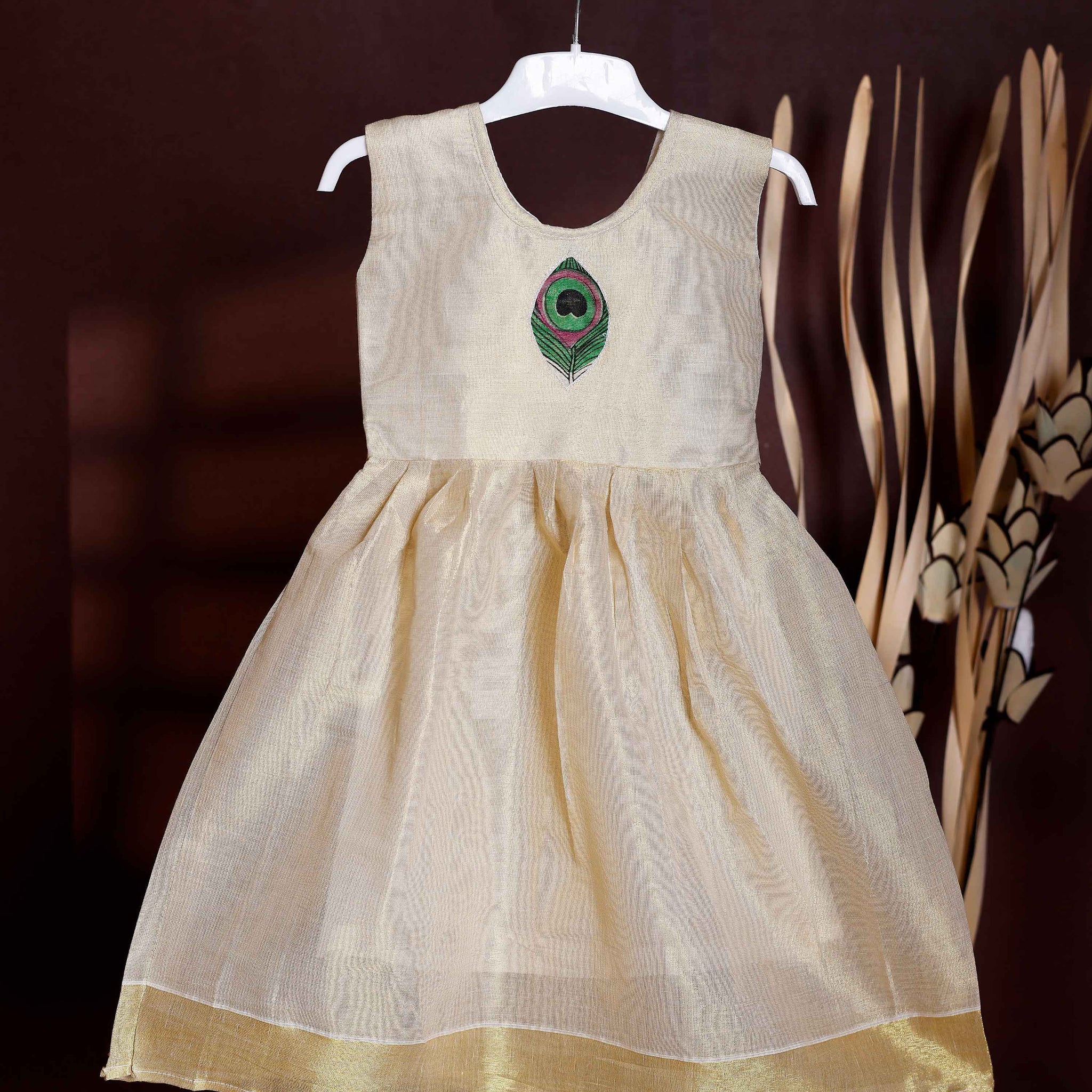 Cotton Sleeveless Kerala Style Girls Frock with Peacock Feather Embroidery - Cream