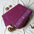 Bengal Cotton Saree With Subtle Woven Motifs And Decorative Border In Purple  Folded Display Close Up View
