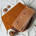 Brown Bengal Cotton Saree With Contrast White Striped Border And Woven Motifs Close Up Draped View