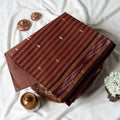 Brown Bengal Cotton Saree With Striped Weave Contrast Border And Woven Motifs  Folded Product View