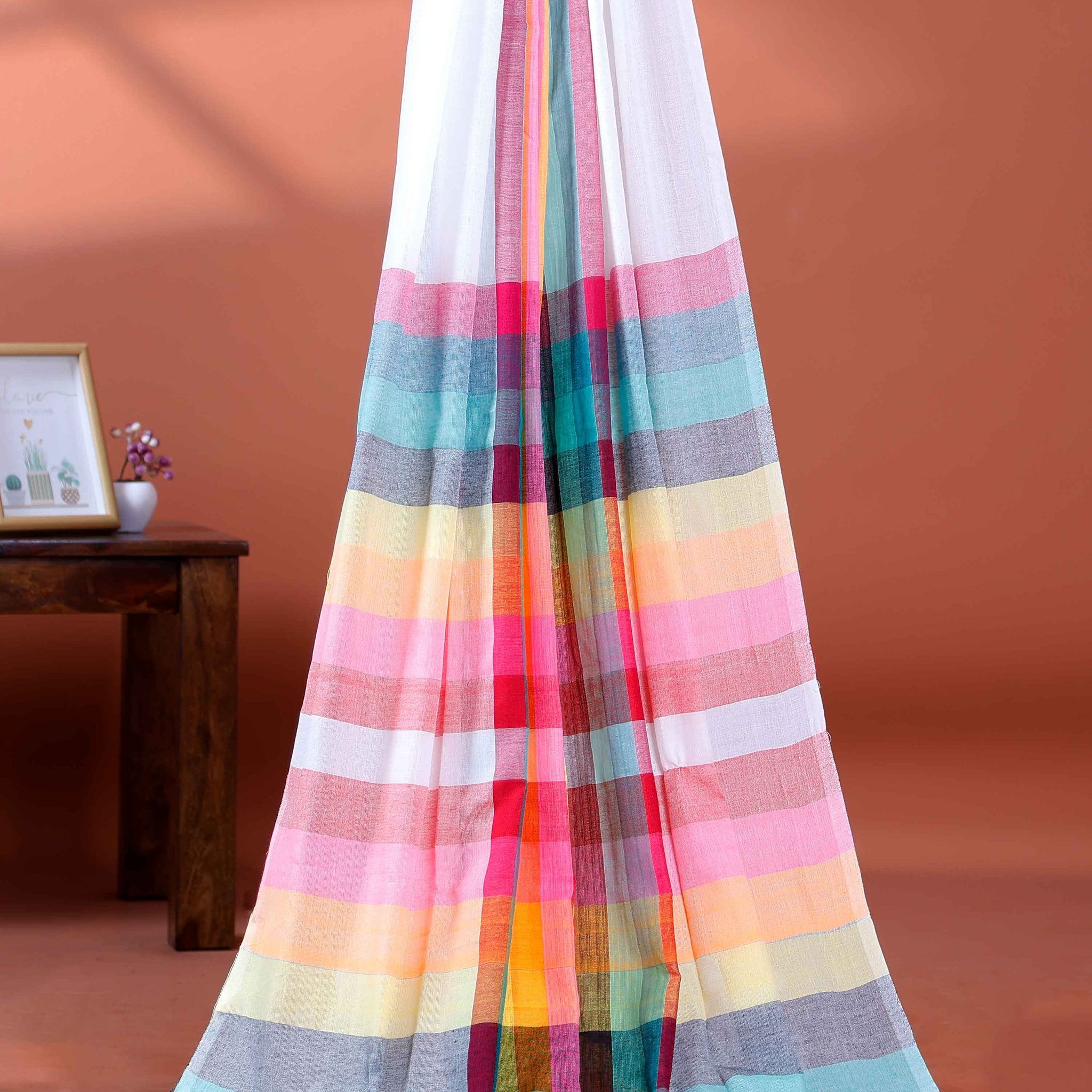 Handloom Mul Mul Cotton Saree with Vertical Stripe Pattern and Decorative Tassels -White