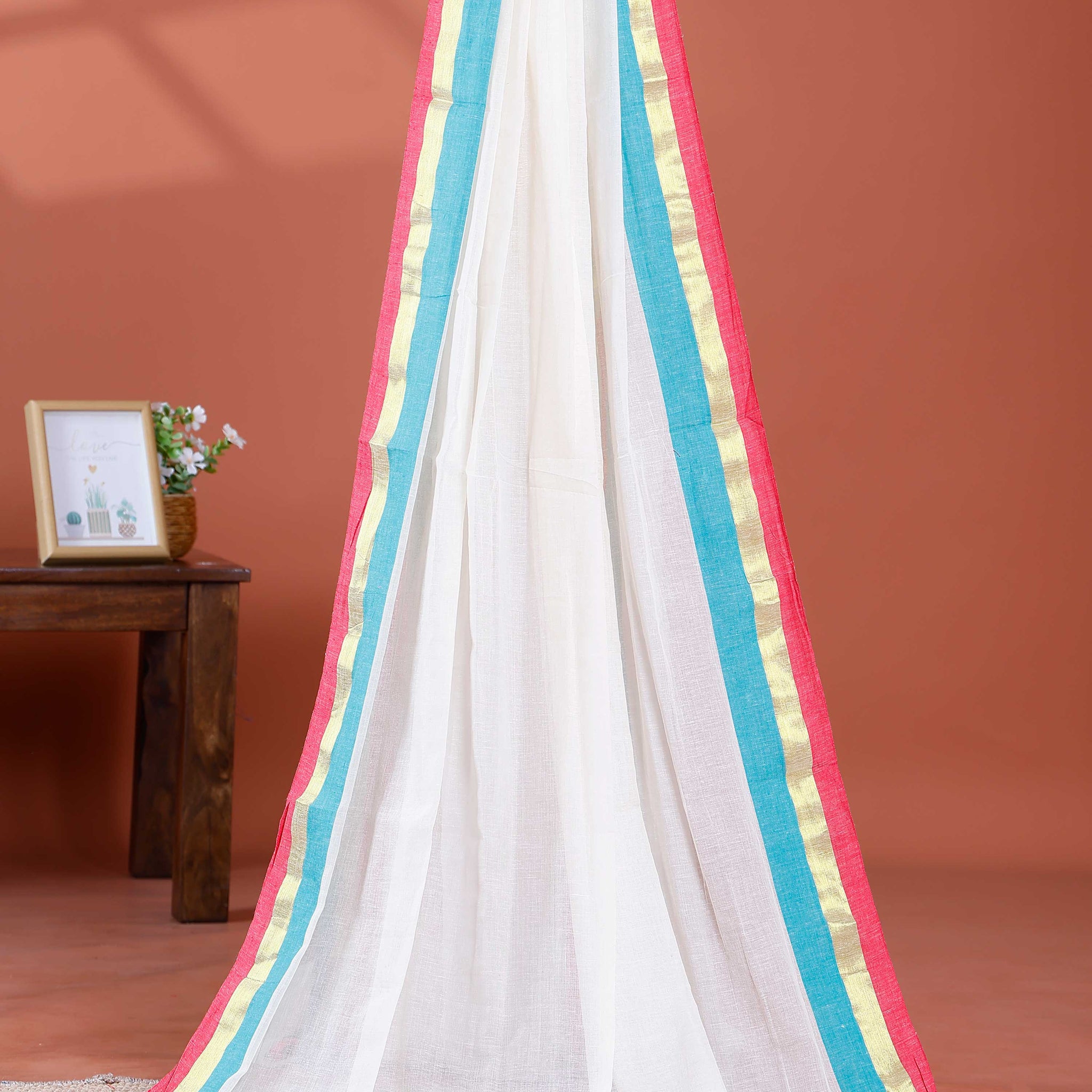 Handwoven Mul Mul Cotton Saree with Subtle Sheen and Contrasting Border – White