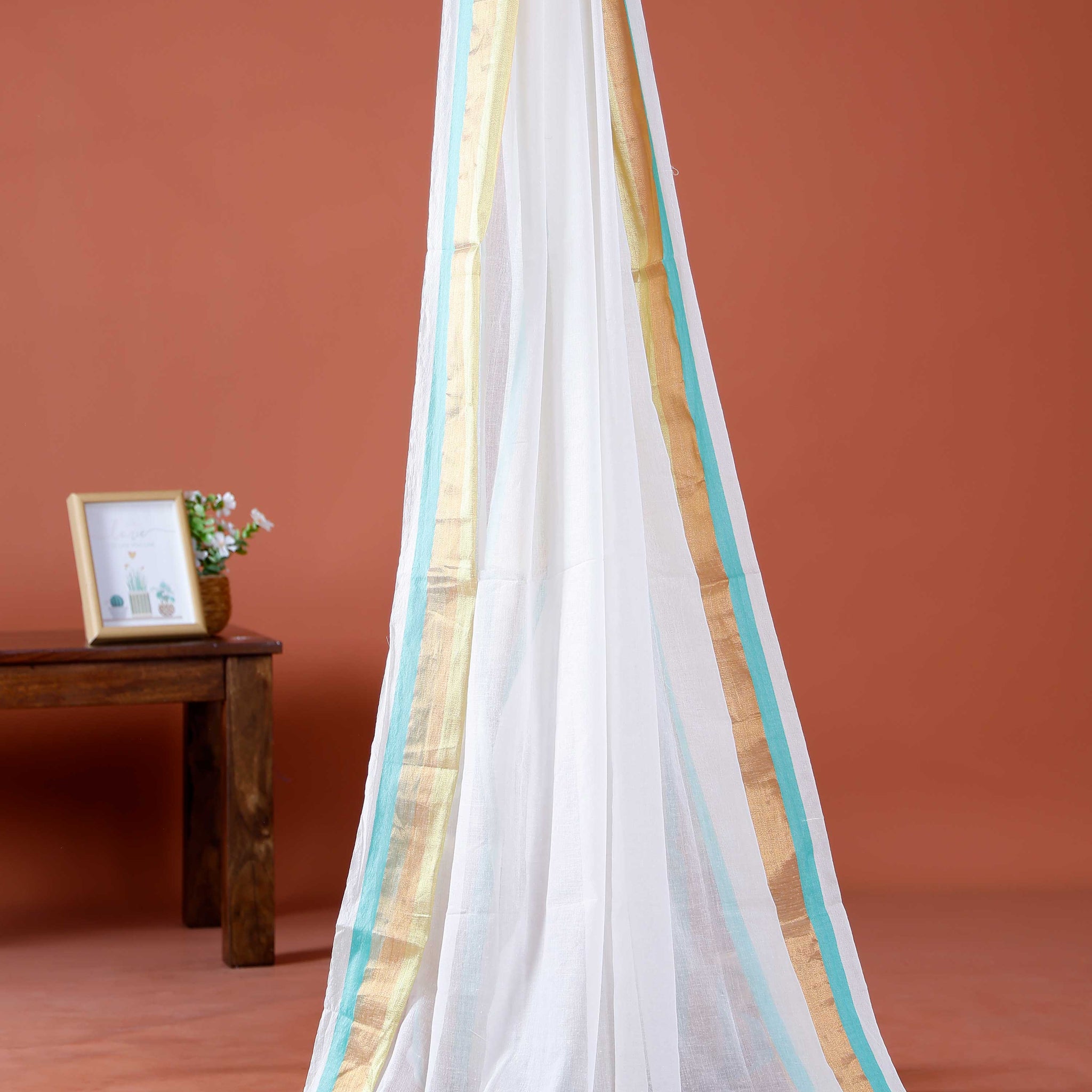 Handwoven Mul Mul Cotton Saree with Subtle Sheen and Contrasting Border – White