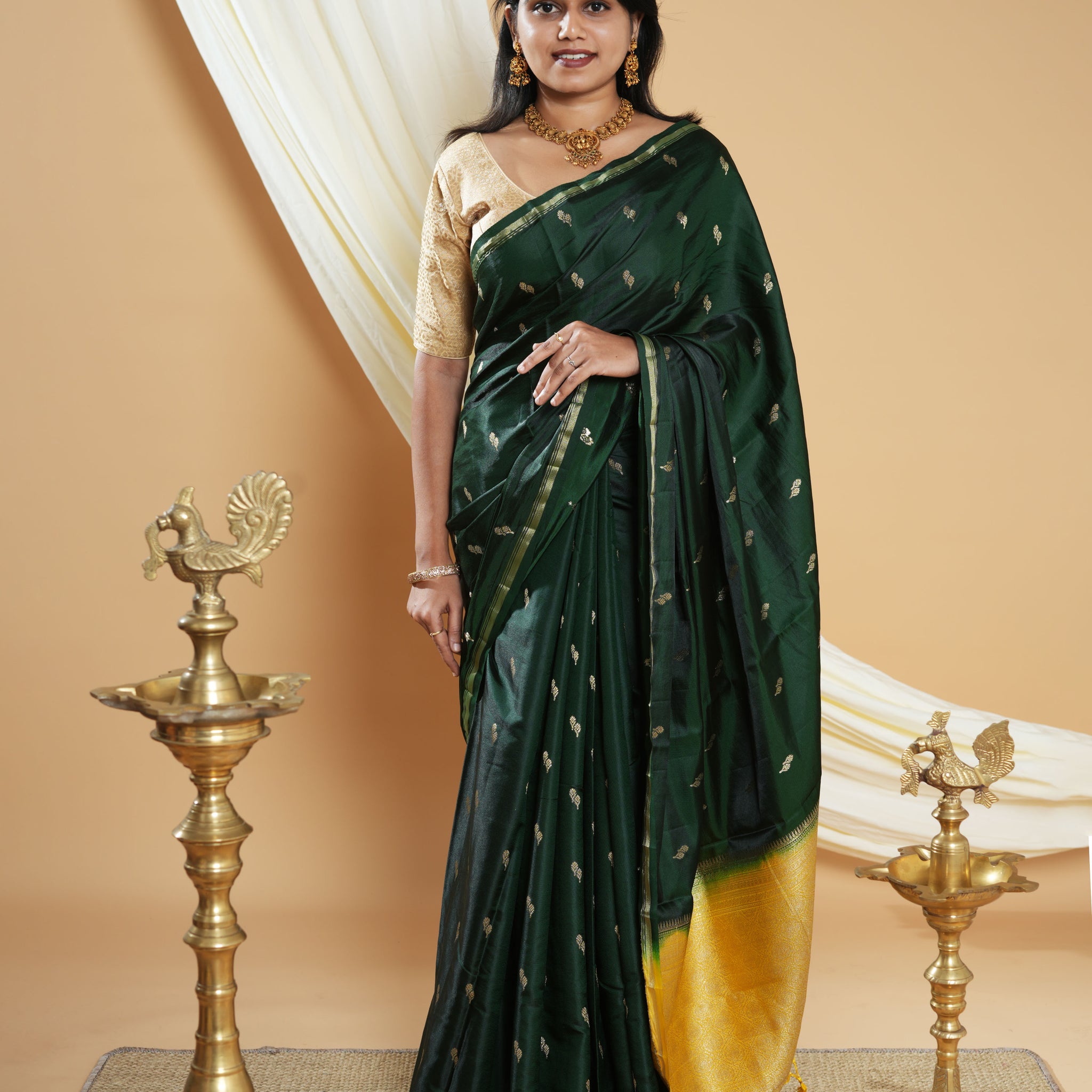 Elegant Handwoven Banarasi Silk Saree Accented with Subtle Zari Buttas and a Classic Zari Border - Green
