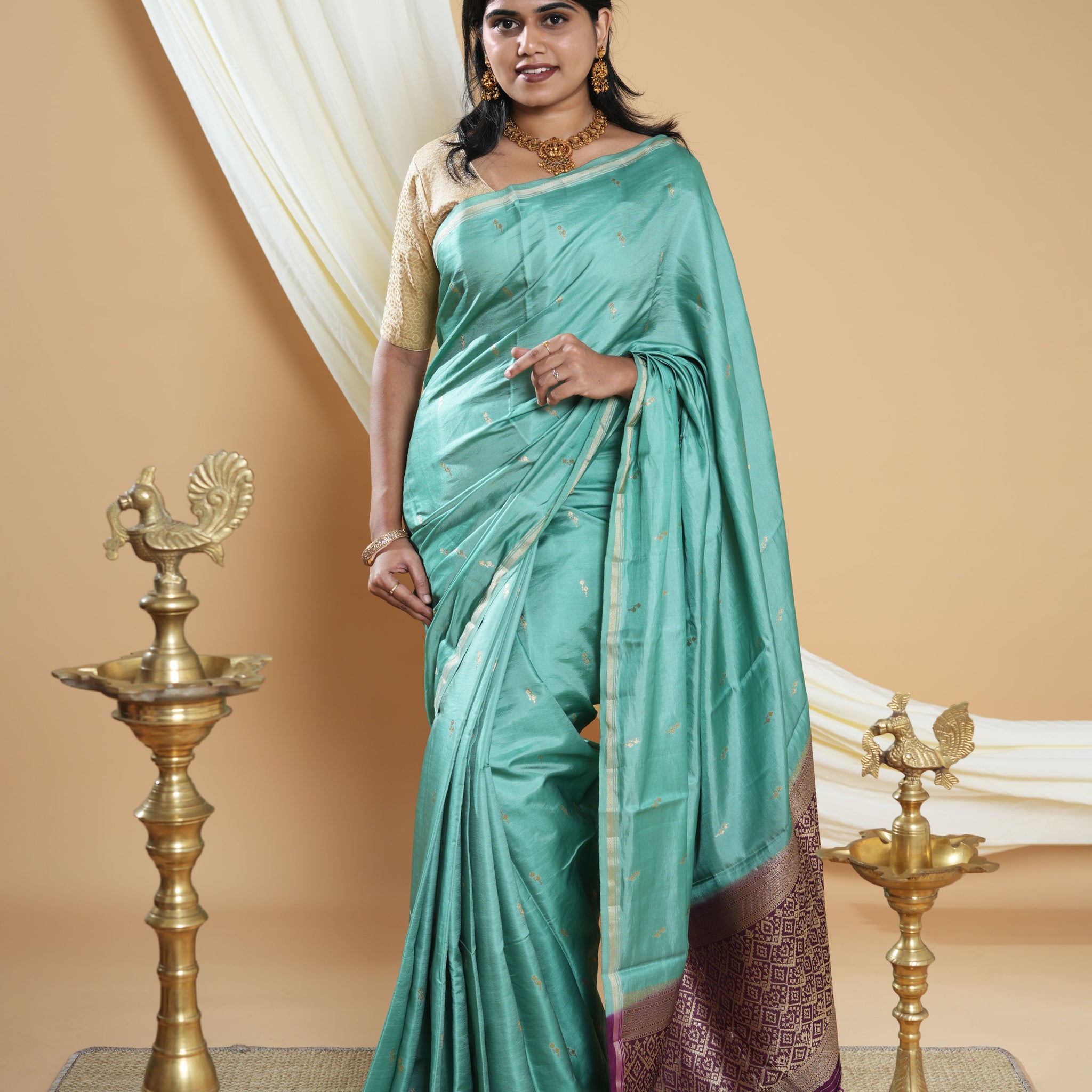 Elegant Handwoven Banarasi Silk Saree Accented with Subtle Zari Buttas and a Classic Zari Border - Green