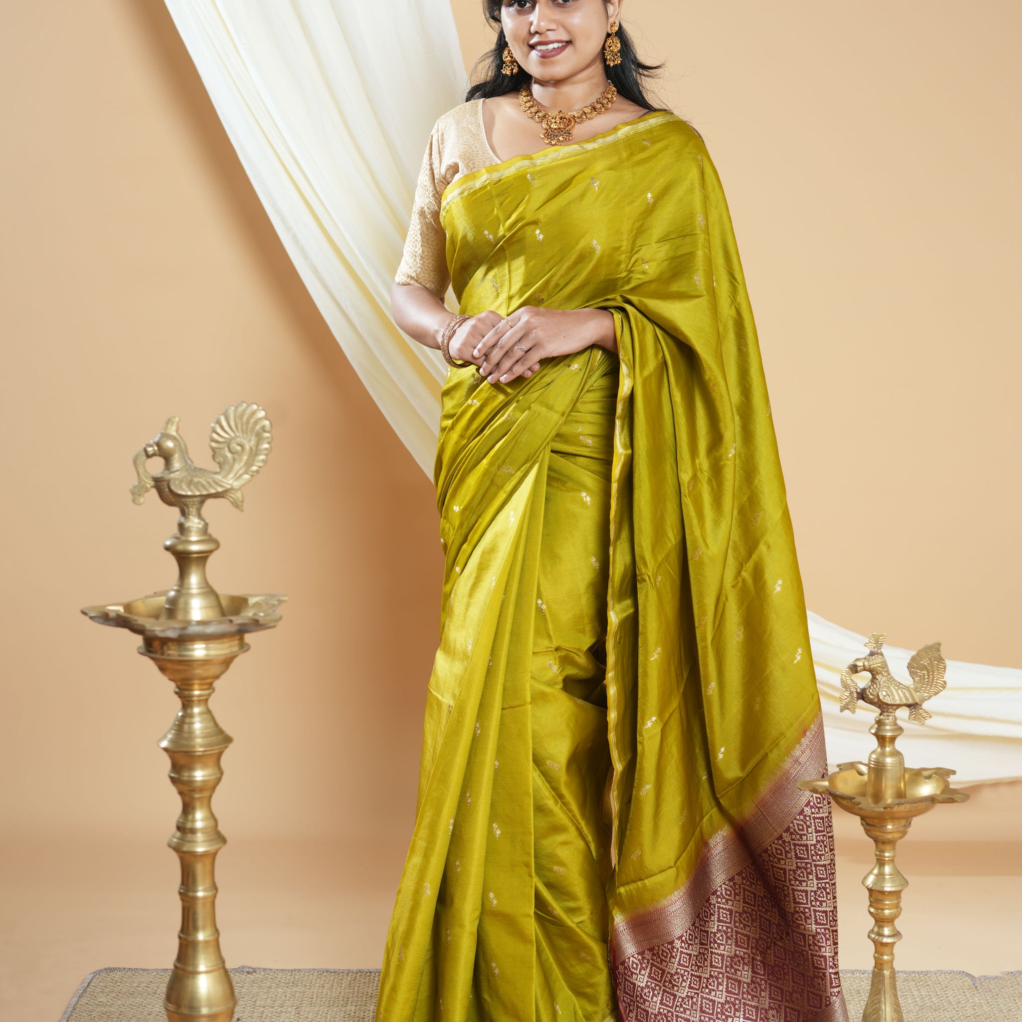 Elegant Handwoven Banarasi Silk Saree Accented with Subtle Zari Buttas and a Classic Zari Border - Green