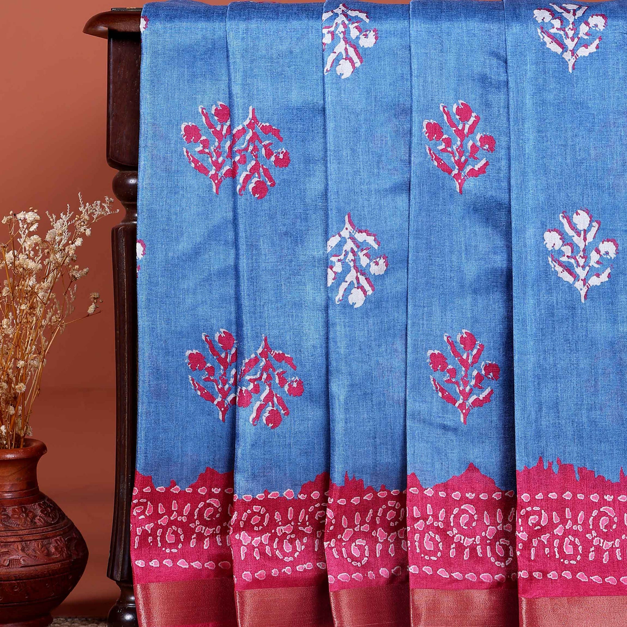 Elegant Dola Saree with Floral Motifs and Contrast Border - Blue