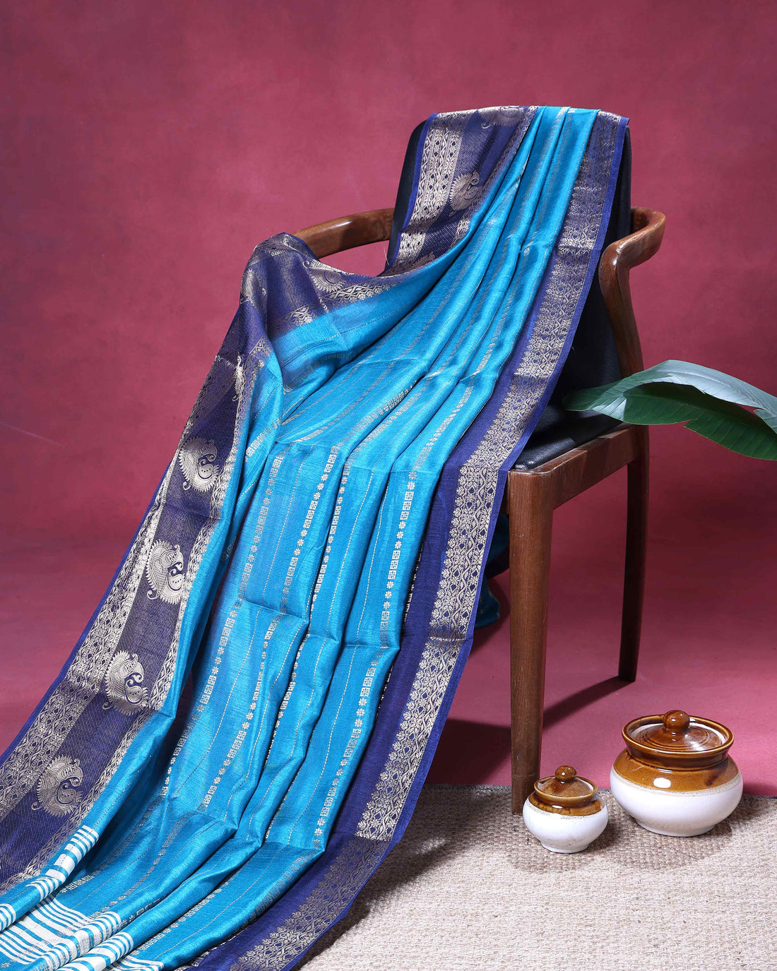 Elegant Dola Saree with Intricate Silver Woven Motifs and Rich Contrast Pallu - Blue