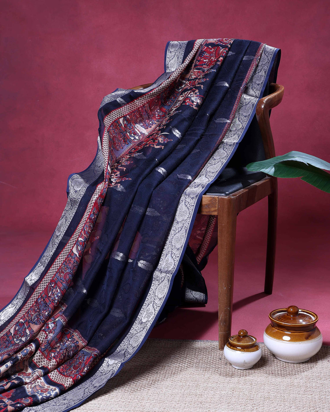 Elegant Dola Saree with Silver Butta Motifs and Traditional Folk Art Border - Navy