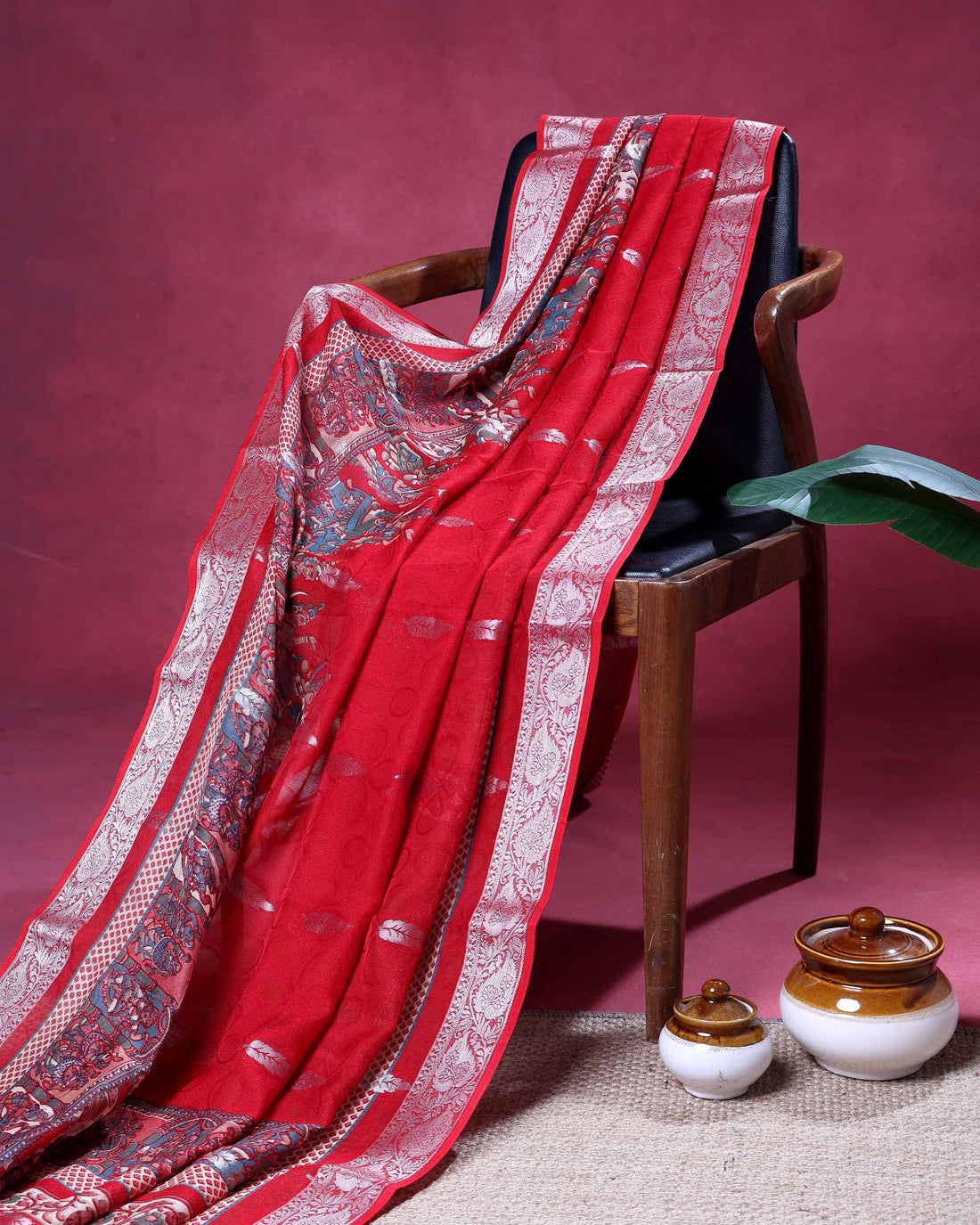 Elegant Dola Saree with Silver Butta Motifs and Traditional Folk Art Border - Red
