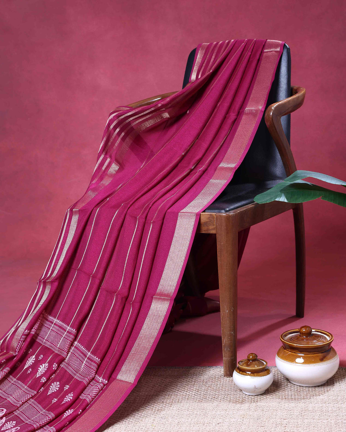 Elegant  Dola Saree with Striped Body and Intricate Zari Woven Paisley and Geometric Motif Contrast Border - Magenta
