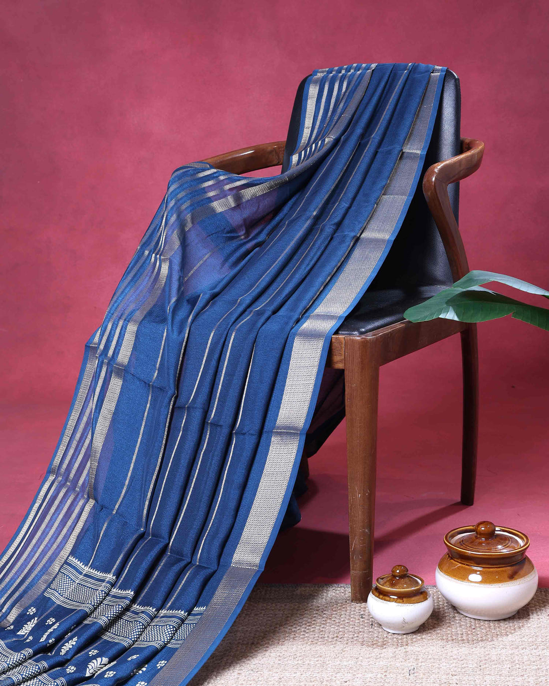 Elegant  Dola Saree with Striped Body and Intricate Zari Woven Paisley and Geometric Motif Contrast Border - Navy Blue