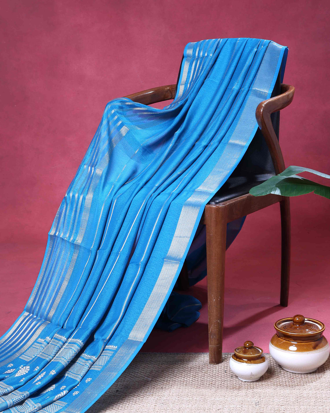 Elegant  Dola Saree with Striped Body and Intricate Zari Woven Paisley and Geometric Motif Contrast Border - Sky Blue