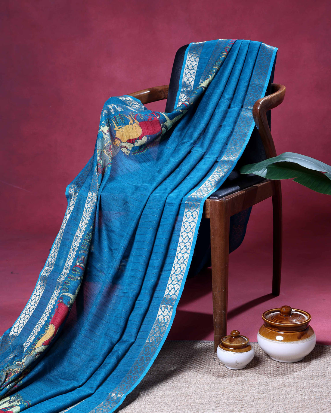 Elegant Dola Saree with Traditional Animal Motifs And A Silver Zari Border - Blue