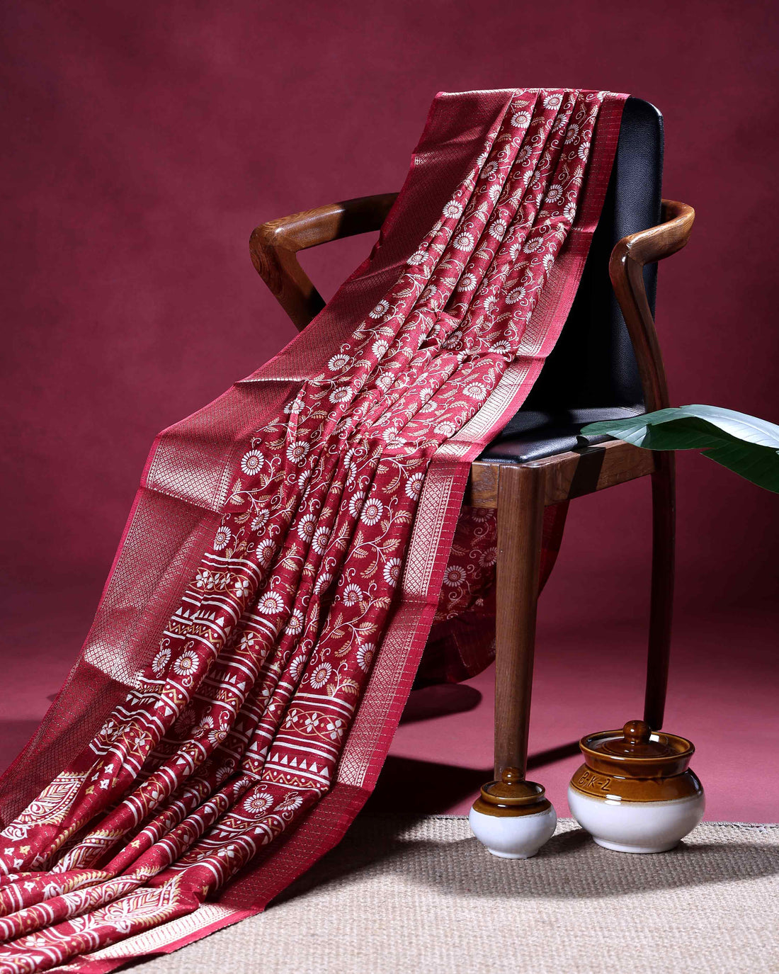 Elegant Dola Silk Saree with All-Over Floral Vine Motifs and Rich Traditional Zari Woven Border - Maroon