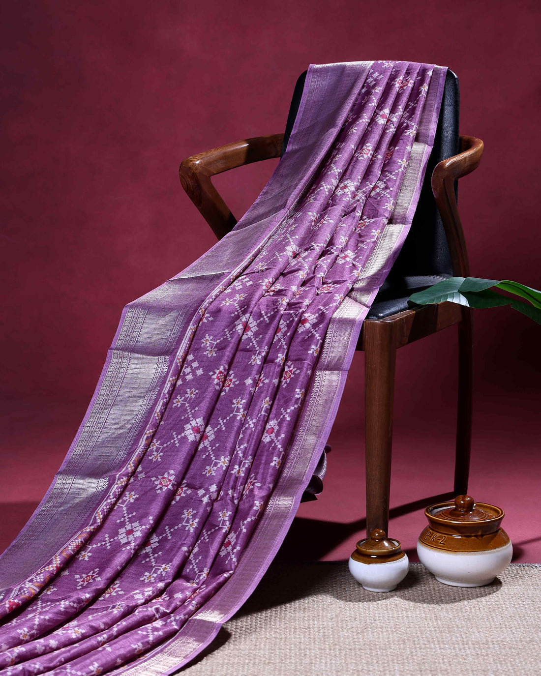 Elegant Dola Silk Saree with All-Over Geometric Floral Motifs and Traditional Zari Woven Border - Purple