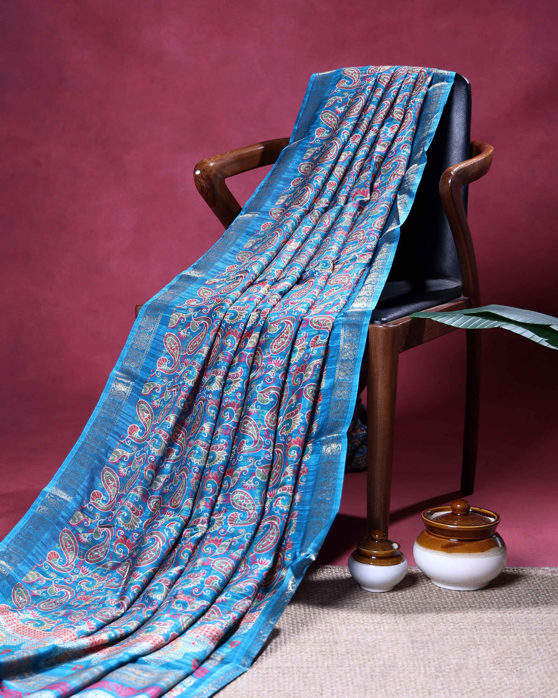 Elegant Dola Silk Saree with All-Over Traditional Paisley Buti Motifs and Intricate Zari Woven Floral Border - Blue