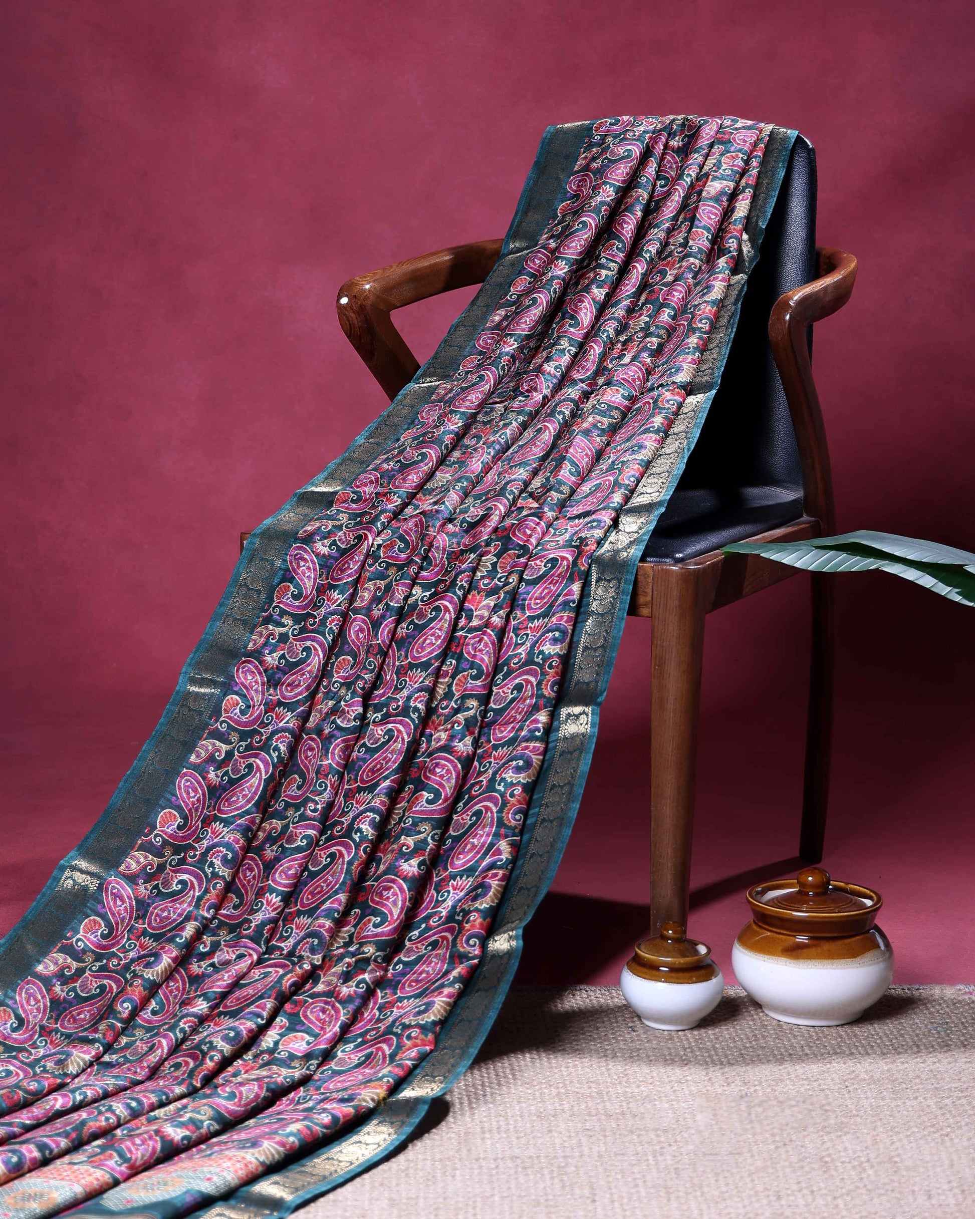 Elegant Dola Silk Saree with All-Over Traditional Paisley Buti Motifs and Intricate Zari Woven Floral Border - Dark Green